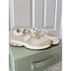 cream new balance sneakers